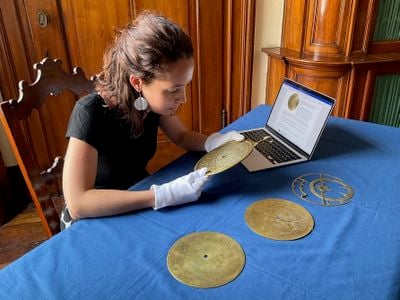 Art historian&nbsp;Federica Gigante examines the device at the&nbsp;Fondazione Museo Miniscalchi-Erizzo in Verona, Italy.