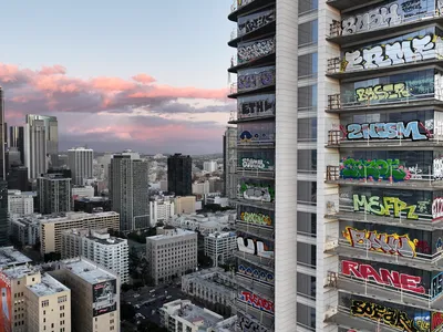 An aerial view of the freshly graffitied Oceanwide Plaza skyscraper development in downtown Los Angeles