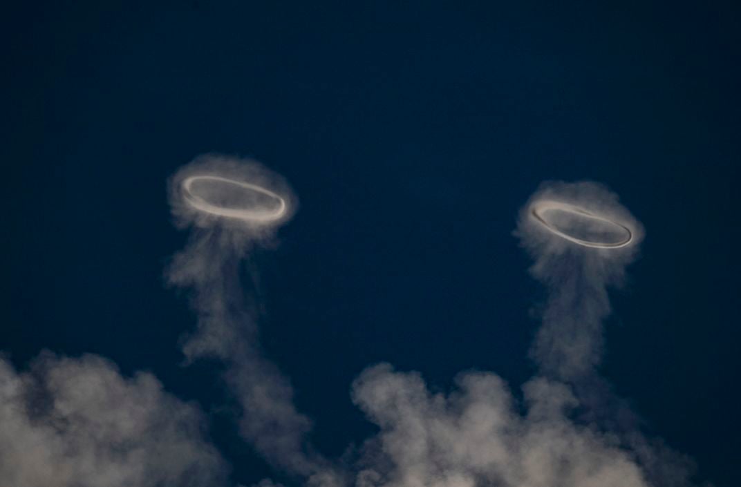 Two rings of condensed water vapor in the sky