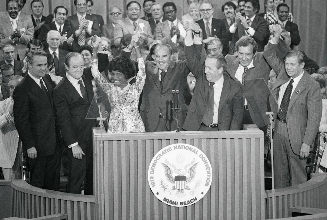 Presidential candidates stand at a podium