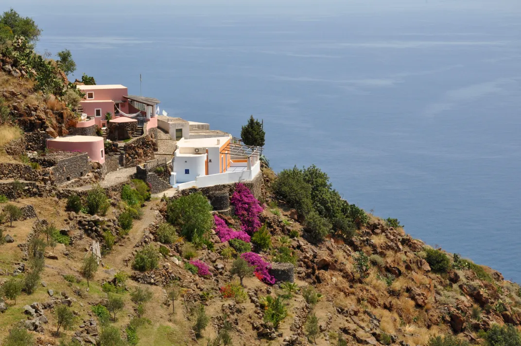 Beautiful view of volcanic island with sea in the distance