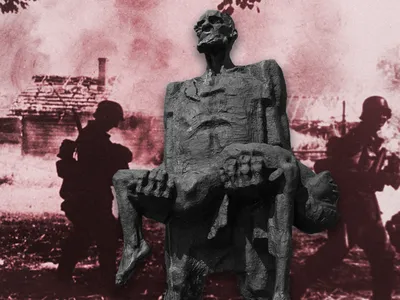 Occupying forces murdered all the inhabitants of 629 razed Belarusian villages, in addition to burning down another 5,454 villages and killing at least a portion of their residents. Pictured: A statue of Khatyn survivor Iosif Kaminsky in front of a Belarusian village destroyed in 1941