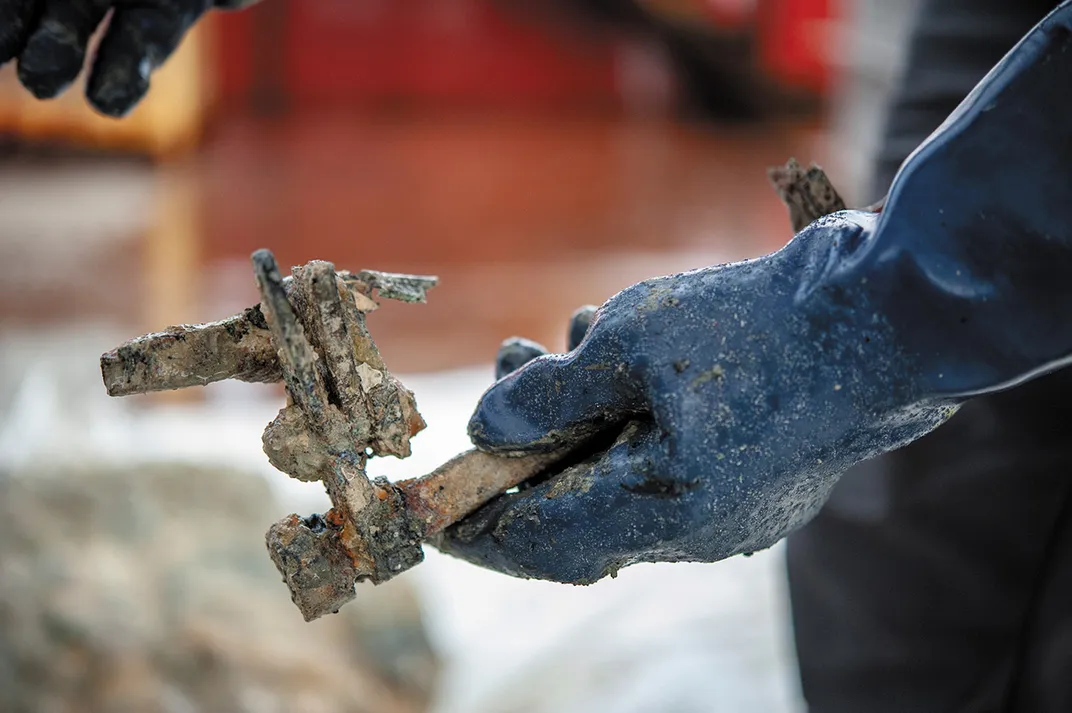 A piece of the cockpit identified as part of a rudder pedal assembly.