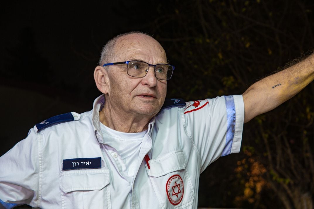 Yair Ron bears his father's number on his arm.